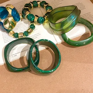 Green resin bangles and beaded bracelet set for women, stylish trendy fashion jewelry gift.