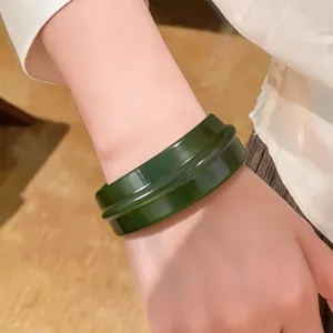 Dark green resin thick bangle bracelet for women, cool style wide stacking fashion hand jewelry.