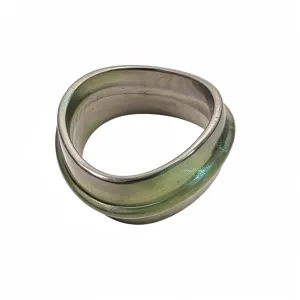 Chic irregular green resin metal bangle bracelet, stylish minimalist fashion jewelry accessory.