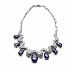 Silver teardrop necklace with sparkling cubic zirconia and elegant wavy design for women.