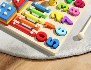 Montessori wooden educational toy detail showing shape sorting, numbers and xylophone parts.