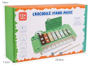 Wooden crocodile xylophone piano toy detail packaging box with colorful keys and mallets.