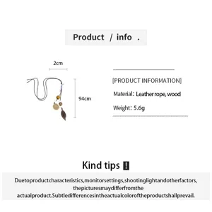 Boho vintage botanical acorn necklace detail view, leather rope and wood material specs.