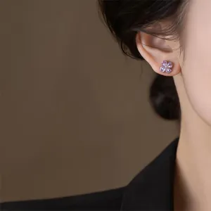 Exquisite purple zircon four-leaf clover ear studs for women, stylish and elegant daily wear.