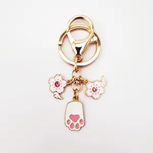 Cute alloy keychain with pink sakura and paw pendant sweet bag charm key ring details