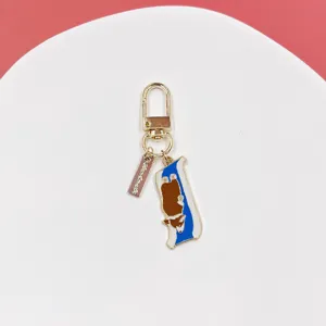 Cute corgi dog keychain alloy bag charm cartoon pendant, exquisite metal detail display.