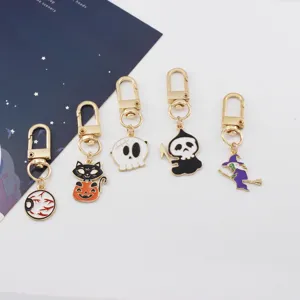 Halloween theme alloy keychain set, cute pumpkin cat and skull bag charm accessories.