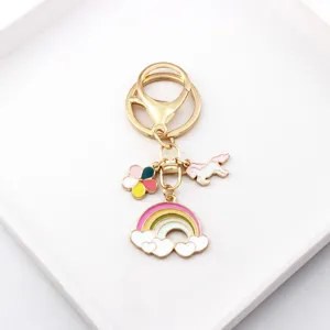 Cute unicorn rainbow metal enamel keychain and bag charm with colorful flower pendants.