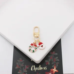 Weihnachten Metall Schlüsselanhänger Taschenanhänger mit Weihnachtsmann Kranz Anhänger.