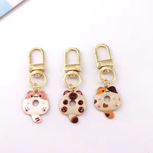 Schattige cartoon kat metaal sleutelhanger, zoete donut kitten hangers voor tassen auto.