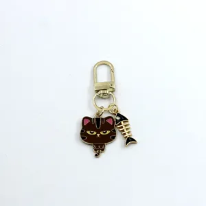 Cute alloy cat and fish skeleton keychain charm for car keys, bag decoration and headphones.