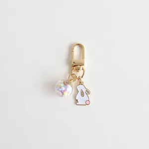 Cute bunny keychain with colorful glass ball charm, sweet girl style bag and airpods accessory.
