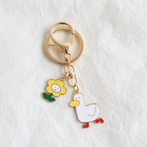 Leuke kleine eend en bloem metalen sleutelhanger voor tas detailaccessoire prachtig