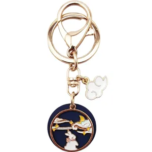 Japanese alloy oil-drop keychain featuring a cute moon rabbit and cloud pendant accessory.