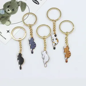 Cute lying cat keychain set, metal alloy key ring with cute animal bag pendant charms for gifts.