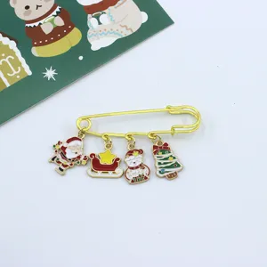Christmas alloy brooch featuring cute Santa, snowman and tree charms for holiday styling.