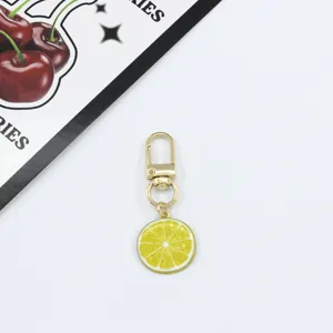 Gold metal lemon slice keychain charm cute fruit pendant for bag purse decoration