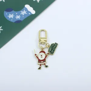 Christmas Santa Claus metal alloy dripping oil keychain bag pendant holiday detail display.