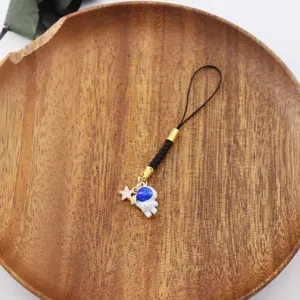 Cute astronaut phone charm with star pendant, perfect for bags and daily accessories.
