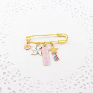 Cute enamel pin brooch with motivational exam pass charm, gold safety pin style accessory.