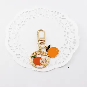 Cute orange fruit metal keychain alloy bag charm summer fresh accessory for keys and airpods.