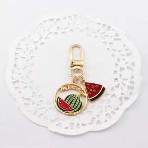 Watermelon keychain alloy pendant detail, lovely summer fruit design for bags and airpods charm.