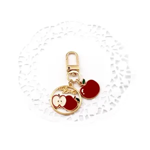 Cute apple metal keychain bag charm with red enamel fruit pendant for summer fashion accessories