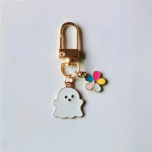 Llavero de fantasma lindo con dije de flor colorida y gancho metálico para bolso o llaves.