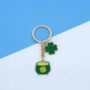 St. Patrick's Day clover pot of gold keychain detail, enamel alloy bag pendant accessory.