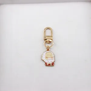 Porte-clés créatif en alliage métallique avec pendentif émaillé style chibi, accessoire parfait.