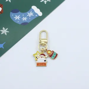 Detail shot of the cute Christmas Santa Claus alloy oil-drip keychain pendant charm.