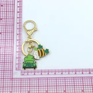 Portachiavi in metallo con trifoglio verde di San Patrizio ciondolo borsa auto decoro