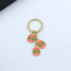 Easter bunny egg keychain, metal enamel pendant key ring for women girls daily bag charm decor.