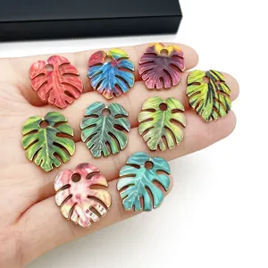 Colorful enamel monstera leaf alloy charms for DIY keychain bag pendant accessories.