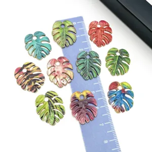 Colorful enamel monstera leaf alloy charms for DIY jewelry accessories and keychain pendants.