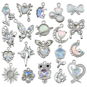 Silver alloy DIY jewelry charms with sparkling rhinestones and opal stones, perfect for necklaces.