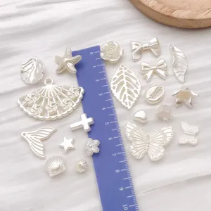 ABS imitation pearl DIY charms with bows and crosses for handmade bracelets and earrings.
