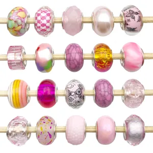 Assorted pink large hole beads for DIY charm bracelets and jewelry making, detailed view.