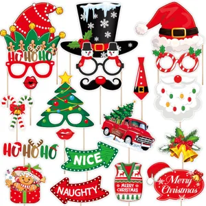 Christmas photo booth props detail showing cute Santa hats, festive glasses, and signs.