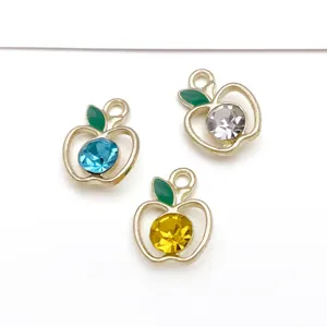 DIY crystal apple pendant charm detail, metal alloy hollow design with green enamel leaves.