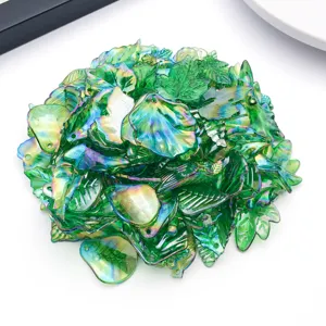 Detailed view of 50g acrylic AB colorful green leaf charms for DIY jewelry making.