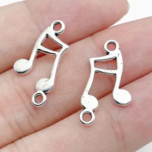 Silver music note charms double loop connectors for DIY bracelet necklace jewelry making supplies.