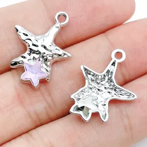Detail view of DIY irregular star alloy jewelry charms, perfect for handmade necklaces earrings.