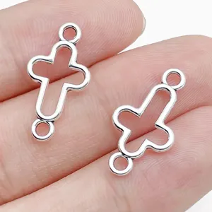 Silver cross connector charms, hollow metal DIY jewelry making components for bracelets.