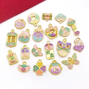 Detail view of Chinese style alloy enamel charms, lucky coin and koi pendants for DIY jewelry.