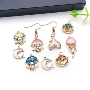 Detailed view of DIY marine charms featuring cute jellyfish, dolphins and seashells.