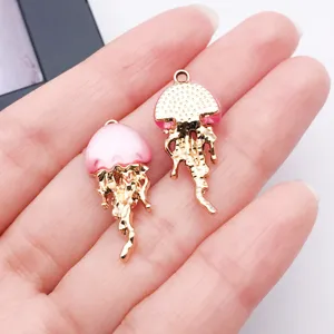 Gold and pink jellyfish charms detail, cute DIY jewelry accessory for handmade earrings and bracelets.