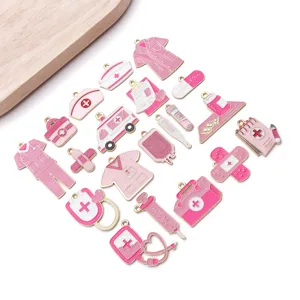Pink medical charms detail view, nurse theme alloy DIY jewelry pendants for handmade keychains.
