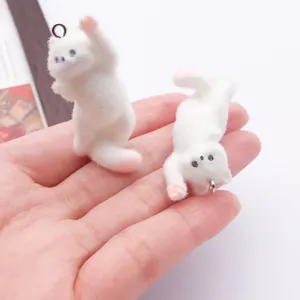 Cute white resin flocked cat keychain pendant, soft touch plush bag charm accessory for keys.