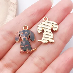 Cute dachshund dog metal pendant charm for DIY jewelry making, cute pet necklace accessory detail shot.
